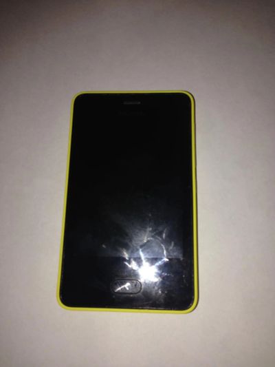 Лот: 7099069. Фото: 1. Nokia asha 501 включается через... Кнопочные мобильные телефоны