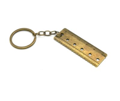 Лот: 25376187. Фото: 1. ★📏 Брелок-линейка золото-медь... Ручной инструмент