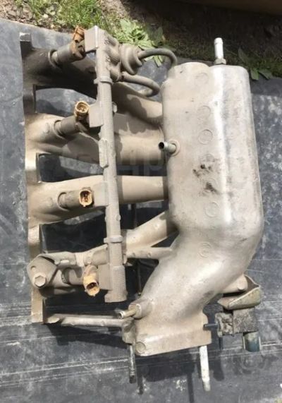 Лот: 24566163. Фото: 1. Коллектор впускной Toyota 7AFE... Двигатель и элементы двигателя