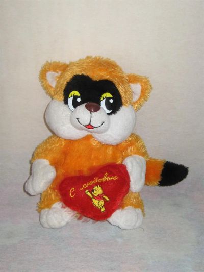 Лот: 3553102. Фото: 1. Игрушка мягкая енот, музыкальный... Музыкальные