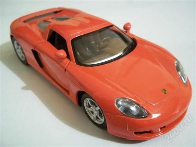 Лот: 704584. Фото: 1. моделька Porcshe Carrera (красная... Автомоделизм