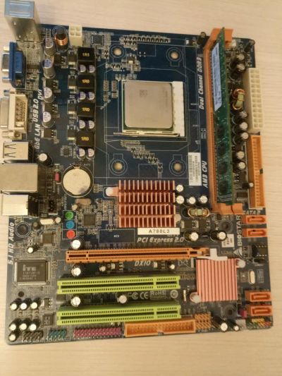 Лот: 10013594. Фото: 1. Biostar A780L + 1Gb оперативы... Материнские платы