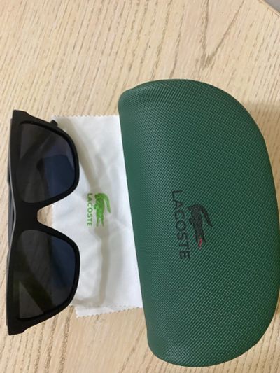 Лот: 19073840. Фото: 1. Очки Lacoste черно-синие. Очки солнцезащитные
