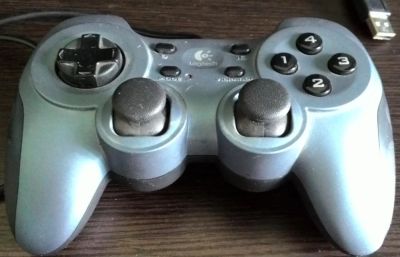 Лот: 5727294. Фото: 1. Logitech RumblePad 2. Рули, джойстики