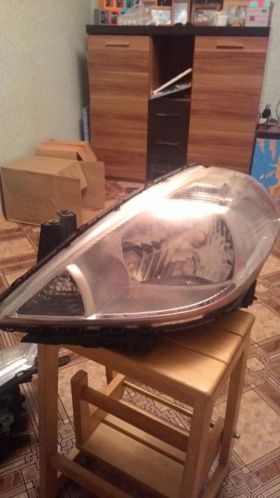 Лот: 6978355. Фото: 1. Фара левая Nissan Tiida. Оптика и освещение