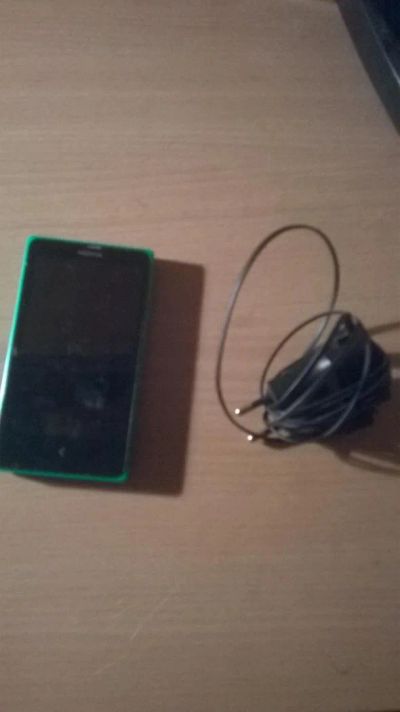 Лот: 6681461. Фото: 1. Nokia X б/у + зарядное устройство. Смартфоны