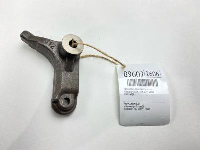 Лот: 23320645. Фото: 1. Кронштейн ролика натяжного Mitsubishi... Двигатель и элементы двигателя