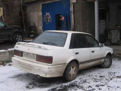 Лот: 152780. Фото: 1. Mazda Familia. Автомобили