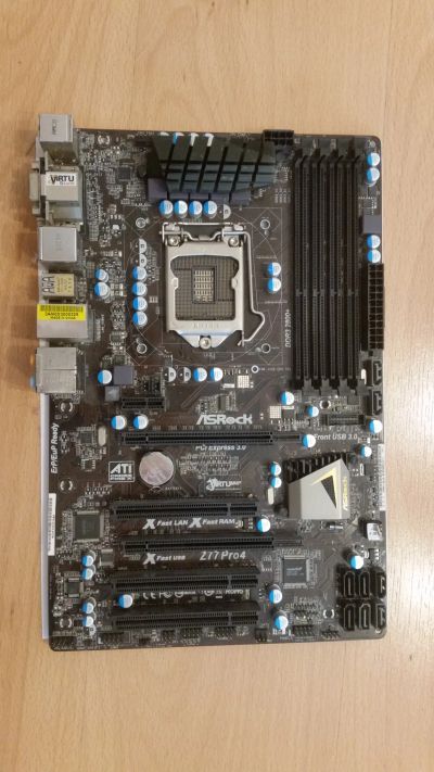 Лот: 19328412. Фото: 1. Материнская плата ASRock Z77 Pro4. Материнские платы