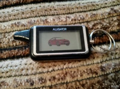 Лот: 14281570. Фото: 1. Брелок от сигнализации Alligator. Автомобильные сигнализации