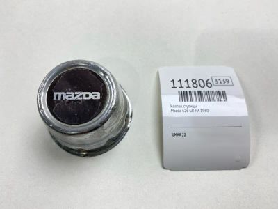 Лот: 25354715. Фото: 1. Колпак ступицы Mazda 626 1980... Двигатель и элементы двигателя