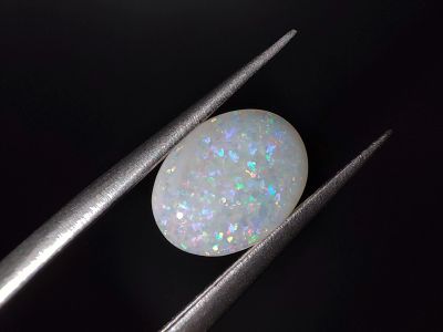Лот: 21094111. Фото: 1. Кабошон: 1.03 ct. Опал овал (Австралия... Драгоценные и поделочные камни