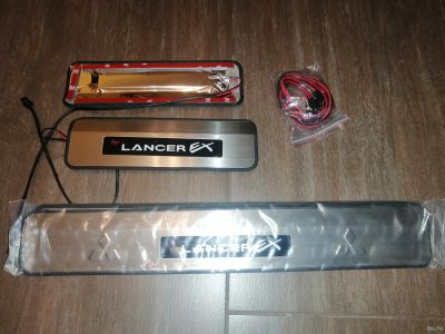 Лот: 17402442. Фото: 1. Led накладки на пороги lancer... Детали тюнинга