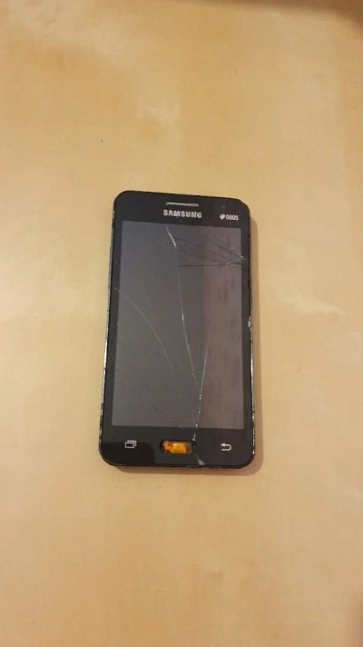 Лот: 14406383. Фото: 1. Samsung G355H/DS. Смартфоны