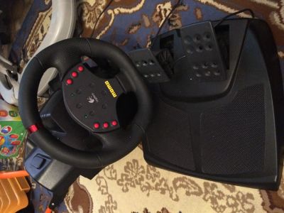 Лот: 5072114. Фото: 1. Продам игровой руль Logitech momo... Рули, джойстики