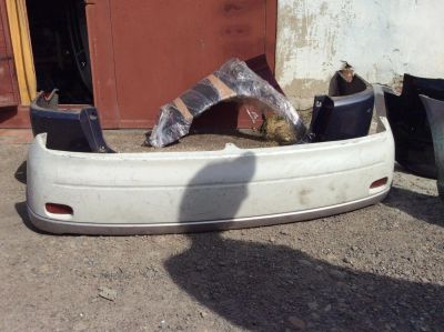 Лот: 5460222. Фото: 1. Бампер задний Toyota Raum EXZ10. Кузов