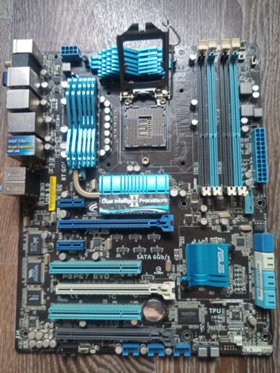 Лот: 20004653. Фото: 1. Asus P8P67 EVO. Материнские платы