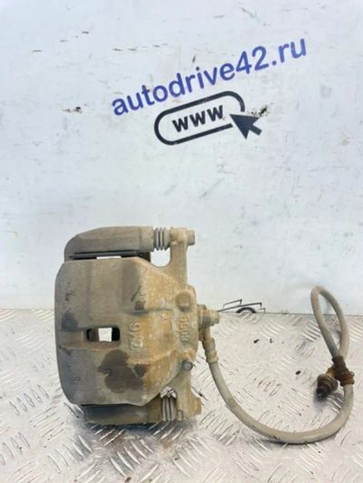 Лот: 25026167. Фото: 1. суппорт тормозной Nissan Qashqai... Тормозная система