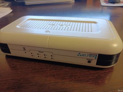 Лот: 18560021. Фото: 1. VoIP-шлюз Eltex TAU-8.IP №1. Маршрутизаторы (роутеры)