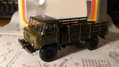Лот: 1412604. Фото: 1. ГАЗ 66 армейский бортовой Масштаб... Автомоделизм
