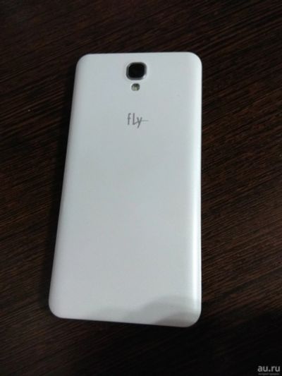 Лот: 12796920. Фото: 1. Телефон Fly FS504 белый. Смартфоны