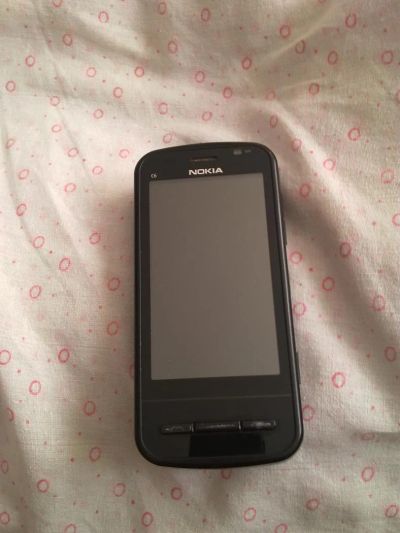 Лот: 3160775. Фото: 1. Nokia c6-00+чехол-книжка(Повторные... Смартфоны