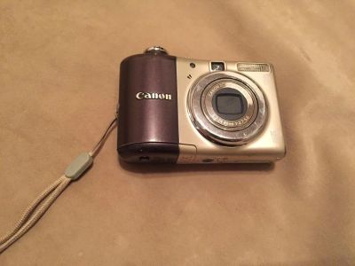 Лот: 8773910. Фото: 1. Продам Canon A1000IS. Цифровые компактные