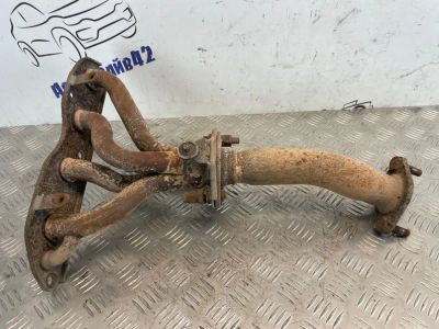 Лот: 24567141. Фото: 1. коллектор выпускной Mitsubishi... Двигатель и элементы двигателя