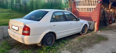 Лот: 25430850. Фото: 1. продам Mazda Familia 1.5 AT, 2000. Автомобили