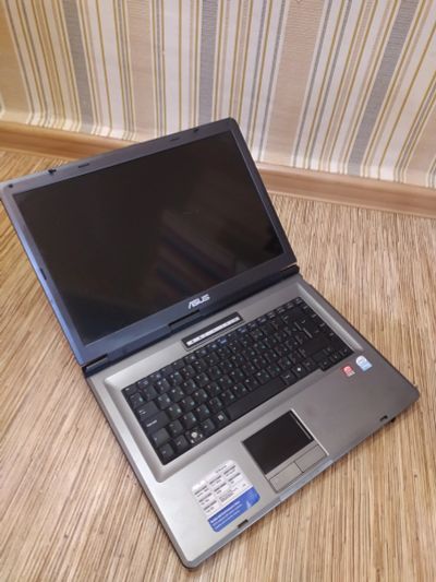 Лот: 15638546. Фото: 1. Ноутбук Asus x51 включается. Ноутбуки