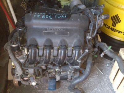 Лот: 4524844. Фото: 1. ДВС L13A для HONDA FIT под разбор. Двигатель и элементы двигателя
