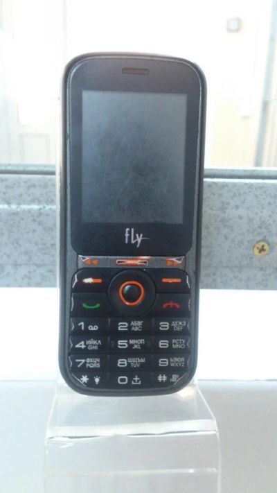 Лот: 7766765. Фото: 1. Сотовый телефон Fly MC165. Кнопочные мобильные телефоны