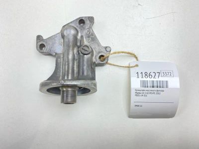 Лот: 25644633. Фото: 1. Кронштейн масляного фильтра Mazda... Расходные материалы