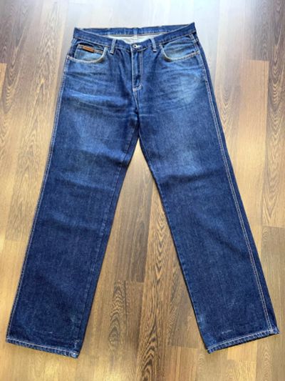 Лот: 19080140. Фото: 1. Джинсы синие 50 размер. Wrangler... Брюки, джинсы, шорты