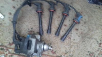 Лот: 10036894. Фото: 1. Трамблёр с броне проводами Nissan. Электрооборудование