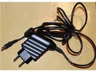 Лот: 146889. Фото: 1. Блок питания цифрового фотоаппарата... Зарядные устройства, блоки питания для бытовой техники