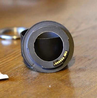 Лот: 1475399. Фото: 1. Переходник М42-Canon с чипом. Крышки, бленды