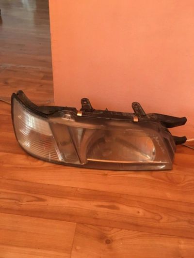 Лот: 12128433. Фото: 1. Фара правая Nissan Bluebird U14. Оптика и освещение