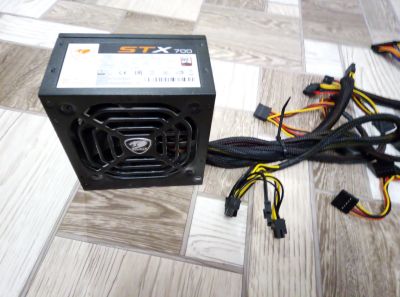 Лот: 18165464. Фото: 1. Блок питания Cougar STX 700. Корпуса, блоки питания