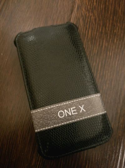 Лот: 11069706. Фото: 1. Черный чехол книжка для HTC One... Чехлы, бамперы