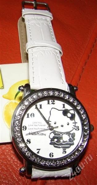 Лот: 1003968. Фото: 1. часы белые Hello Kitty. Оригинальные наручные часы