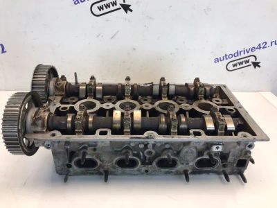 Лот: 21704202. Фото: 1. головка блока цилиндров Opel Astra... Двигатель и элементы двигателя