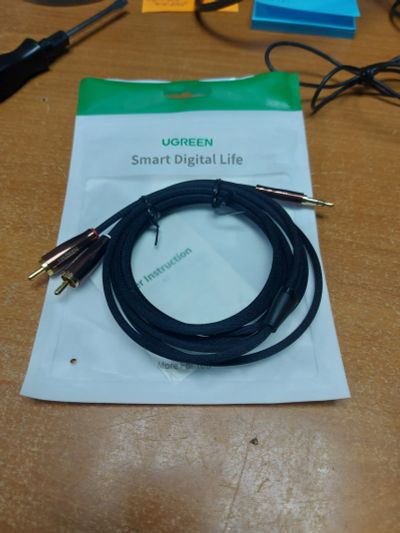 Лот: 25882166. Фото: 1. Кабель Jac 3.5" - 2*RCA Ugreen. Шлейфы, кабели, переходники