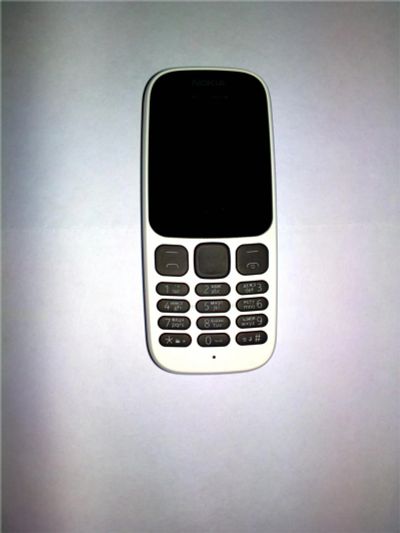 Лот: 11360814. Фото: 1. Сотовый телефон Nokia 105 new... Кнопочные мобильные телефоны