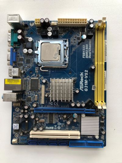 Лот: 24966845. Фото: 1. Материнская плата ASRock G31M-VS2... Материнские платы