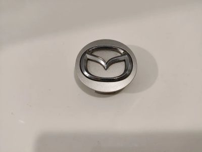 Лот: 21577372. Фото: 1. Колпачок для литья Mazda оригинал... Колпаки