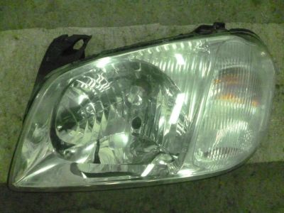 Лот: 10814302. Фото: 1. Фара передняя левая Mazda Tribute... Оптика и освещение