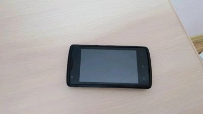 Лот: 11801043. Фото: 1. Смартфон Lenovo A1000 8 ГБ черный... Смартфоны