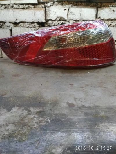Лот: 12240337. Фото: 1. Фара Фонарь задний левый kia rio... Оптика и освещение