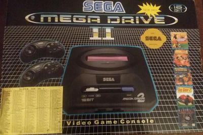 Лот: 6659175. Фото: 1. Sega Mega Drive 2 + картридж с... Консоли